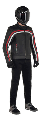 Alpinestars Dyno Leather Jacket, Motorcycle Jacket, Black with Ruby Red and Ecru stripes, worn with a black carbon-fiber helmet and black pants, featuring a heritage-inspired design with premium leather and a regular fit