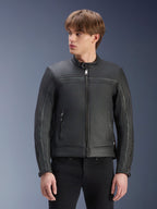 Alpinestars Dyno Leather Jacket, black bovine leather urban motorcycle jacket with heritage styling worn by a man.