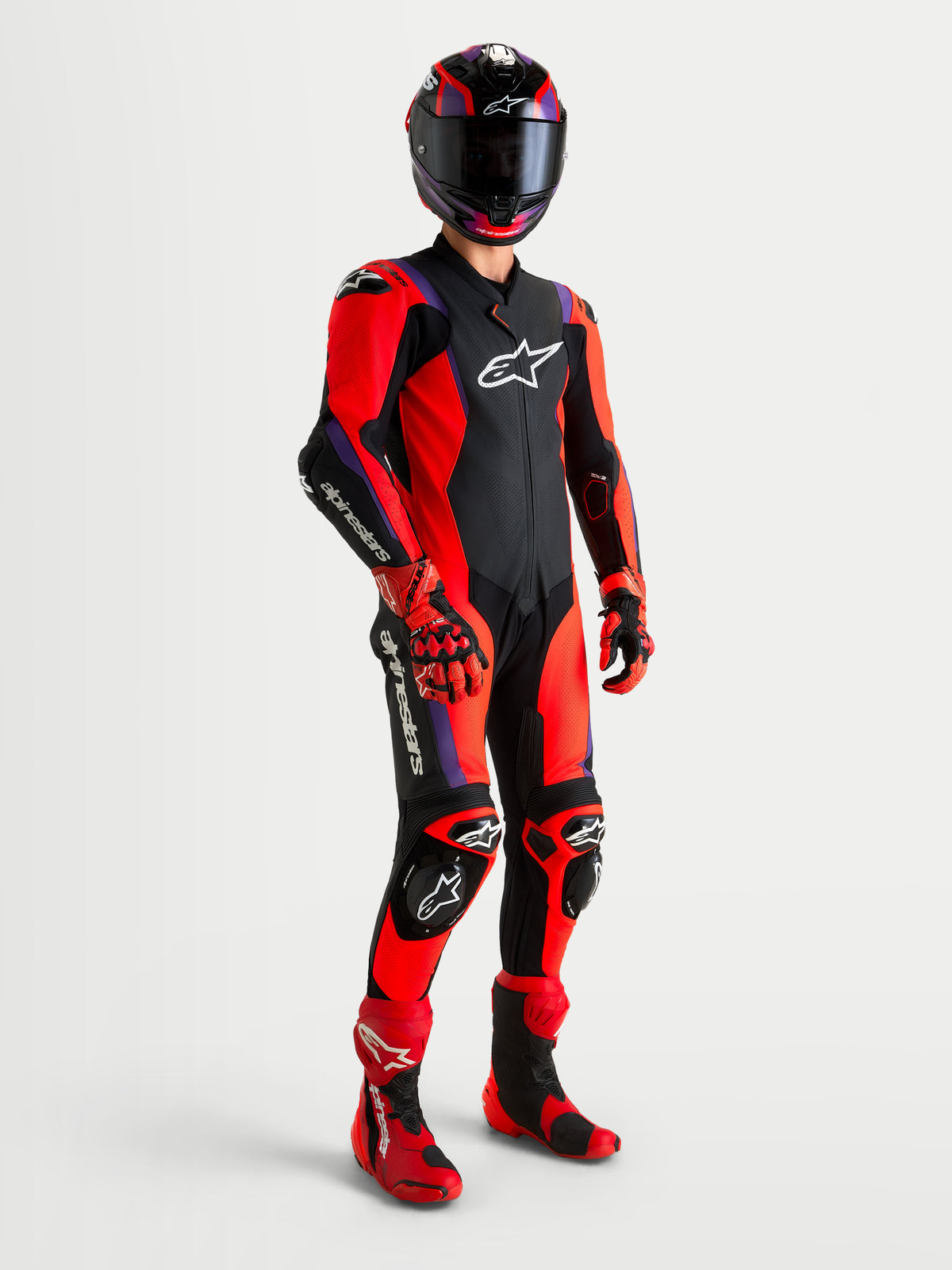 Alpinestars Missile V3 Leather Suit 1 Pc, 1-piece motorcycle racing leather suit, Black, Red, and Purple, AAA certified with DFS armor and ventilated chassis panels, shown on a model