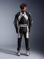 Alpinestars GP Plus V4 Sprint 1 Piece Leather Suit, Men's Racing Gear in Black and White with Red Fluo and aerodynamic hump.