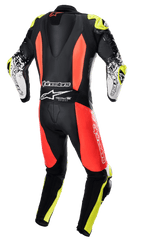 Alpinestars GP Tech V4 Leather Suit, 1-piece racing suit, Black Red Fluo and Yellow Fluo, rear view showing aerodynamic back hump, Alpinestars branding, and Tech-Air Ready logo, professional track performance design
