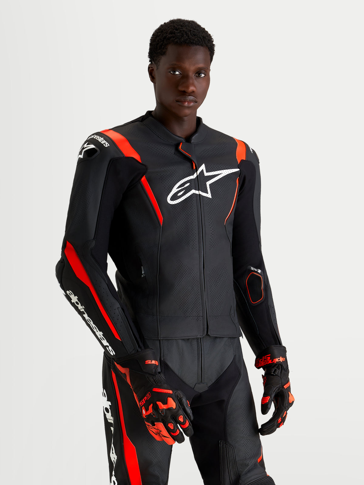 Alpinestars Missile V3 Leather Suit 2 Piece, Black and Red Fluo, men's motorcycle racing suit featuring premium bovine leather construction and protective armor