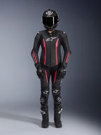 Alpinestars Stella Missile V2 1-Piece Suit, Women's Motorcycle Racing Suit, Black and Red, full protective gear with helmet, gloves, and boots, sleek aerodynamic design