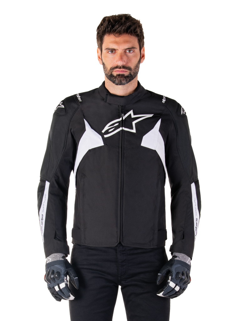 Alpinestars T-Jaws V4 Waterproof Jacket, Black and White, men's sport textile motorcycle jacket, featuring a white star logo on the chest, white shoulder accents, and white forearm stripes, high collar, athletic fit for road riding