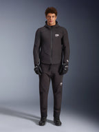 Alpinestars Aeroshell Waterproof Jacket, black hooded softshell motorcycle jacket for road riding, worn by male model.