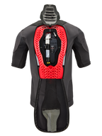 Alpinestars Tech-Air® 5 Plasma Airbag Replacement Canister, shown inside a Tech-Air® 5 Plasma vest, black garment with a bright red honeycomb internal frame, featuring the argon gas cylinder and electronic unit, technical motorcycle safety gear.