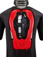Alpinestars Tech-Air 5 Plasma Airbag System, internal view showing the installed black replacement canister and electronic control unit, integrated into a bright red Nucleon Plasma back protector within a black protective vest