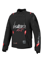Alpinestars Halo Pro Drystar® XF Laminated Jacket, Black with red and grey accents, featuring dual asymmetrical waterproof front zippers, a large chest logo, and a modular technical textile design for adventure riding.