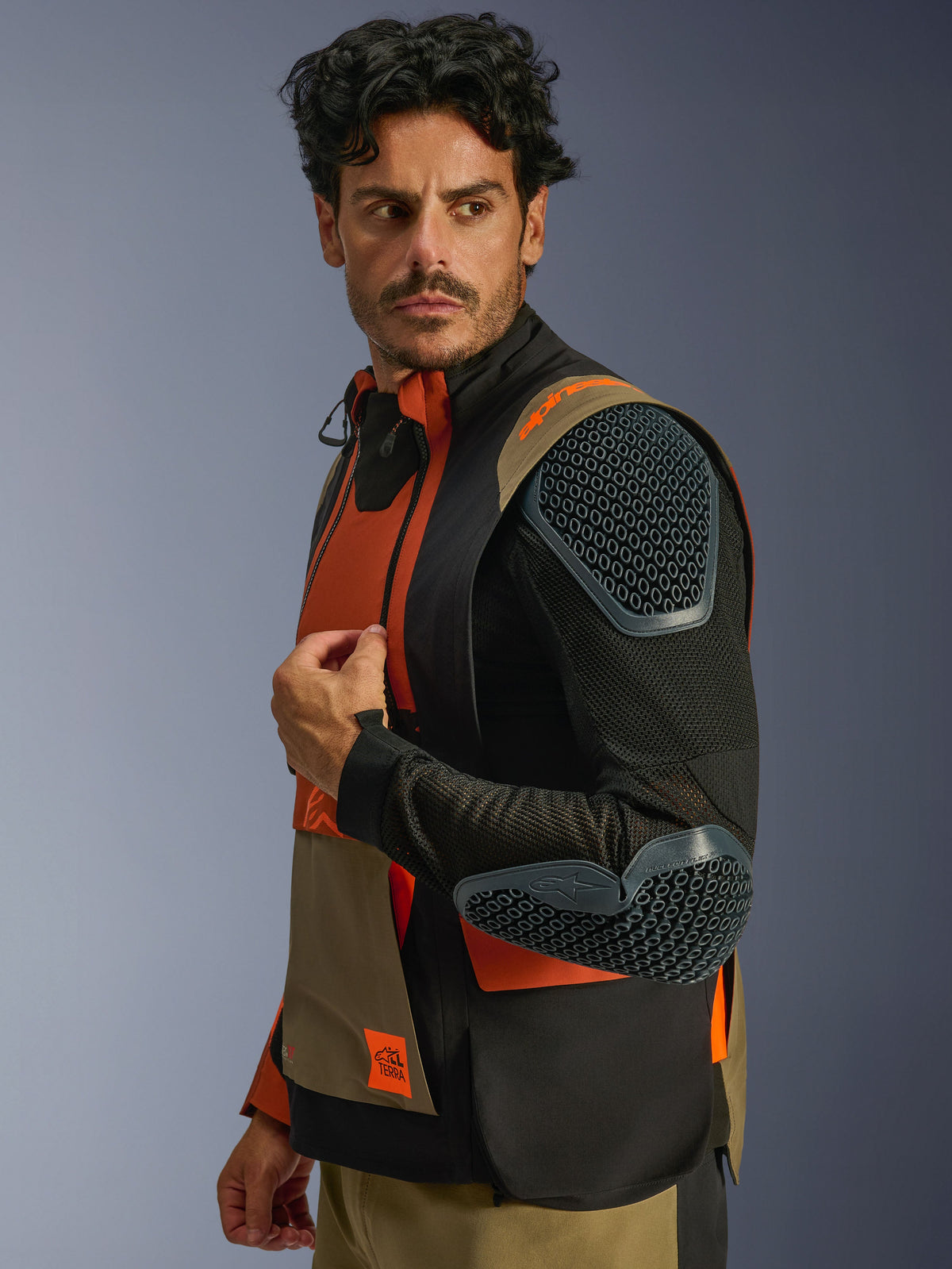 Alpinestars Halo Pro Drystar® XF Laminated Jacket, Walnut Rust Black, modular design with outer sleeves removed to show breathable mesh and integrated Nucleon Flex Pro armor on shoulder and elbow, adventure touring motorcycle apparel