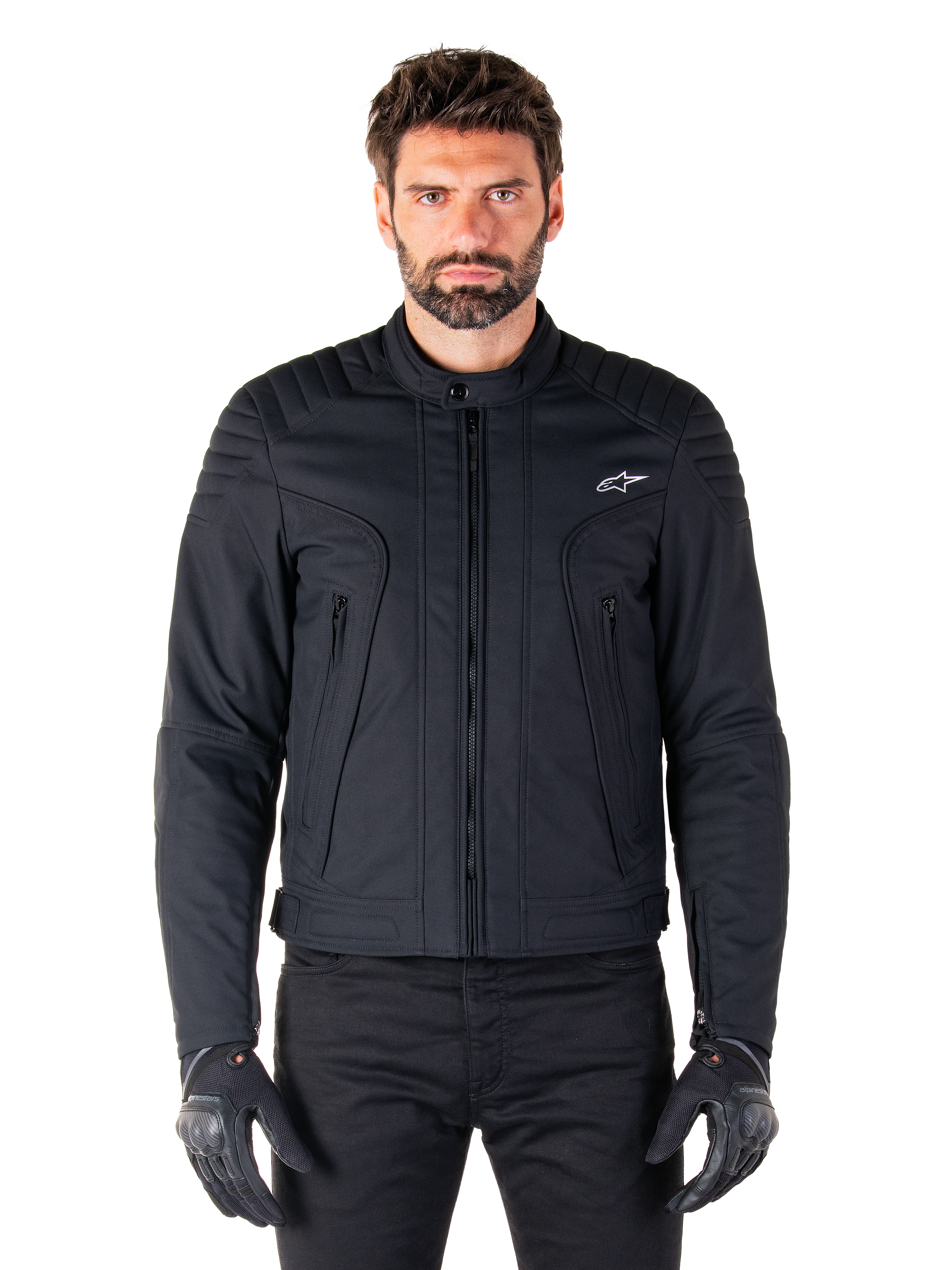 Alpinestars Clayton WR Jacket, Black Motorcycle Jacket, worn by model, featuring quilted shoulder details and technical graphics, central Vislon zipper, vertical zippered pockets, small white logo on chest, urban riding gear for road use