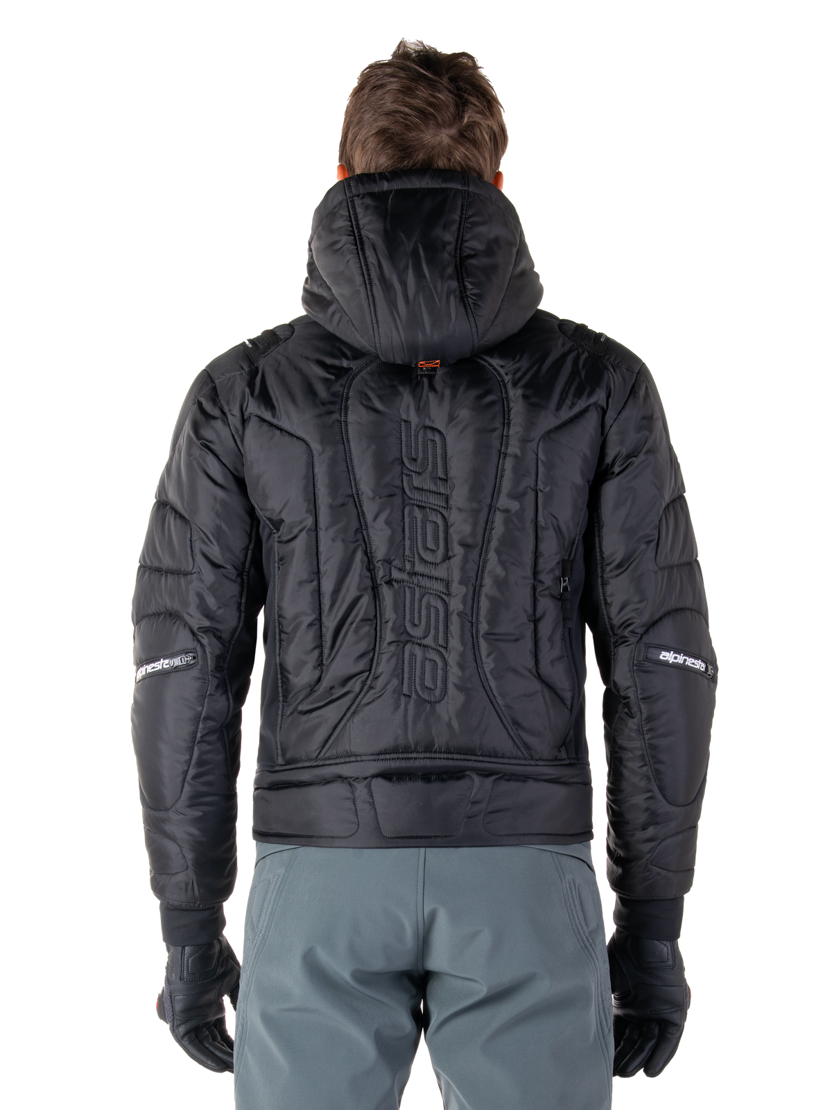 Alpinestars Mohobbs Waterproof Jacket, Black, rear view showing quilted padded construction, vertical 'astars' wordmark on the back, hood up, contemporary moto streetwear style