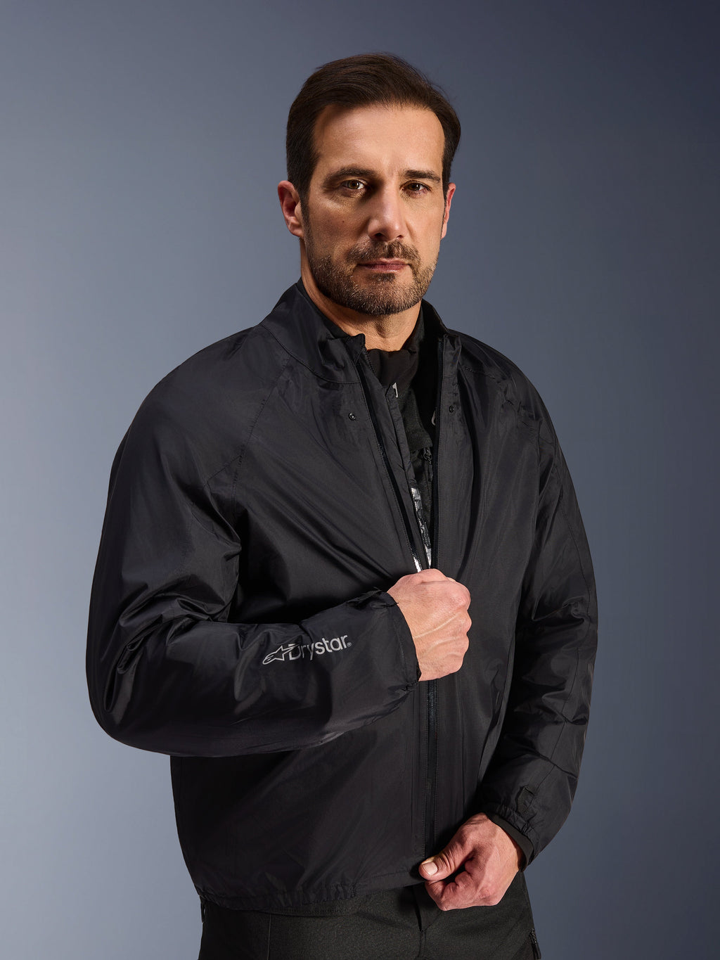 Alpinestars Cusco Drystar® Jacket, Black waterproof adventure touring gear worn by a male model.