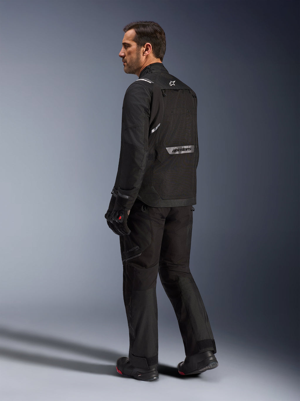 Alpinestars Cusco Drystar® Jacket, black textile adventure touring motorcycle jacket with reflective back branding.