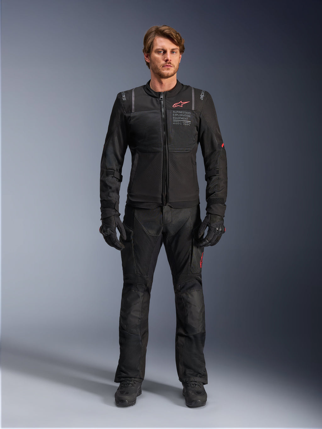 Alpinestars ST-2 Air Jacket, men's adventure touring motorcycle jacket, black textile with mesh panels, shown on-model.