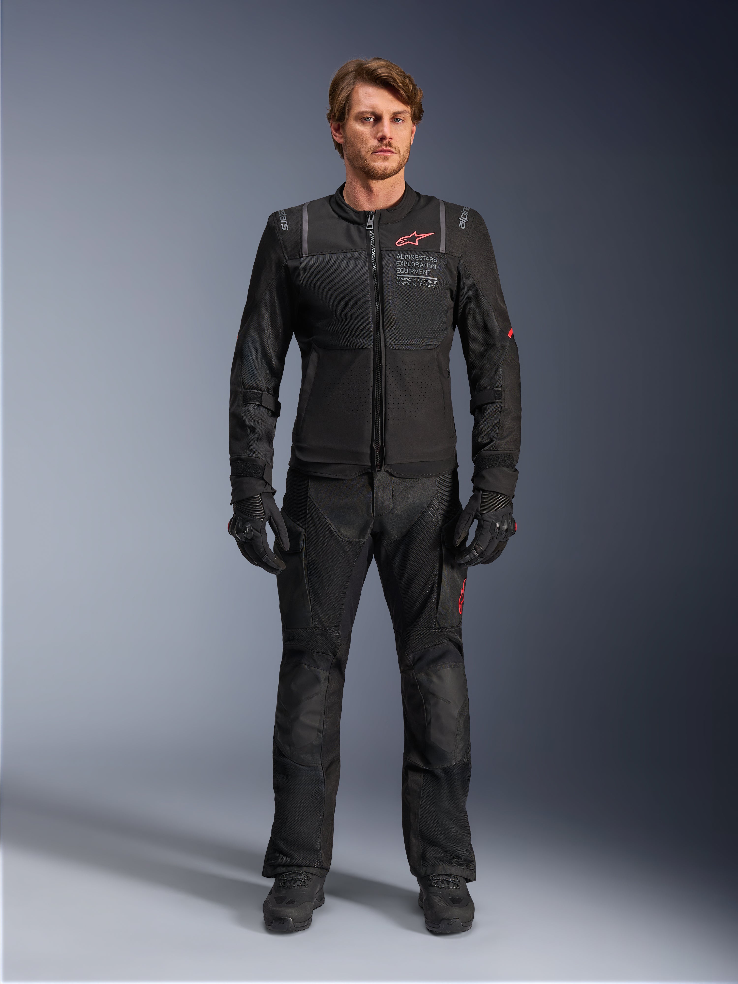 Alpinestars ST-2 Air Jacket, men's adventure touring motorcycle jacket, black textile with mesh panels, shown on-model.