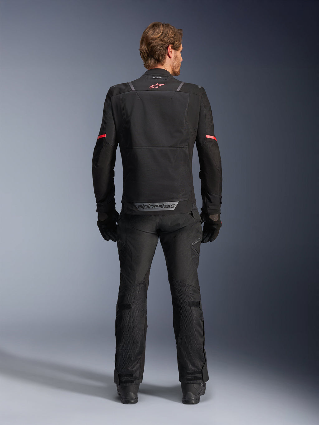 Alpinestars ST-2 Air Jacket, black motorcycle touring jacket for men, featuring back mesh ventilation panels.