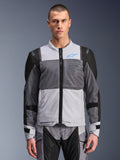 Alpinestars ST-2 Air Jacket, Men's Motorcycle Jacket, Ice Gray and Dark Gray with Black accents, wide mesh ventilation panels, laser-perforated front, blue Alpinestars logo, front zipper, worn by a model with matching riding pants