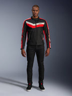 Alpinestars T-Dyno WR Jacket, textile motorcycle jacket in Black Bright Red and Ecru, featuring V-shaped chest stripes and star branding on the sleeves, worn with black pants and black riding shoes, heritage-inspired urban gear