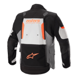 Alpinestars Halo Drystar® Jacket, Adventure Touring Jacket, Dark Gray Ice Gray and Black with orange accents, rear view showing a large back vent panel with 'astars ADVENTURE TECH' branding and orange star logo on the lower pocket, technical multi-season motorcycle gear