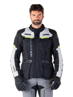 Alpinestars Bogotá Pro Drystar® Jacket, men's adventure touring jacket in black and gray with yellow fluo accents.