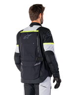 Alpinestars Bogota' Pro Drystar® Jacket, men's textile adventure touring jacket in Black and Yellow Fluo, rear view.