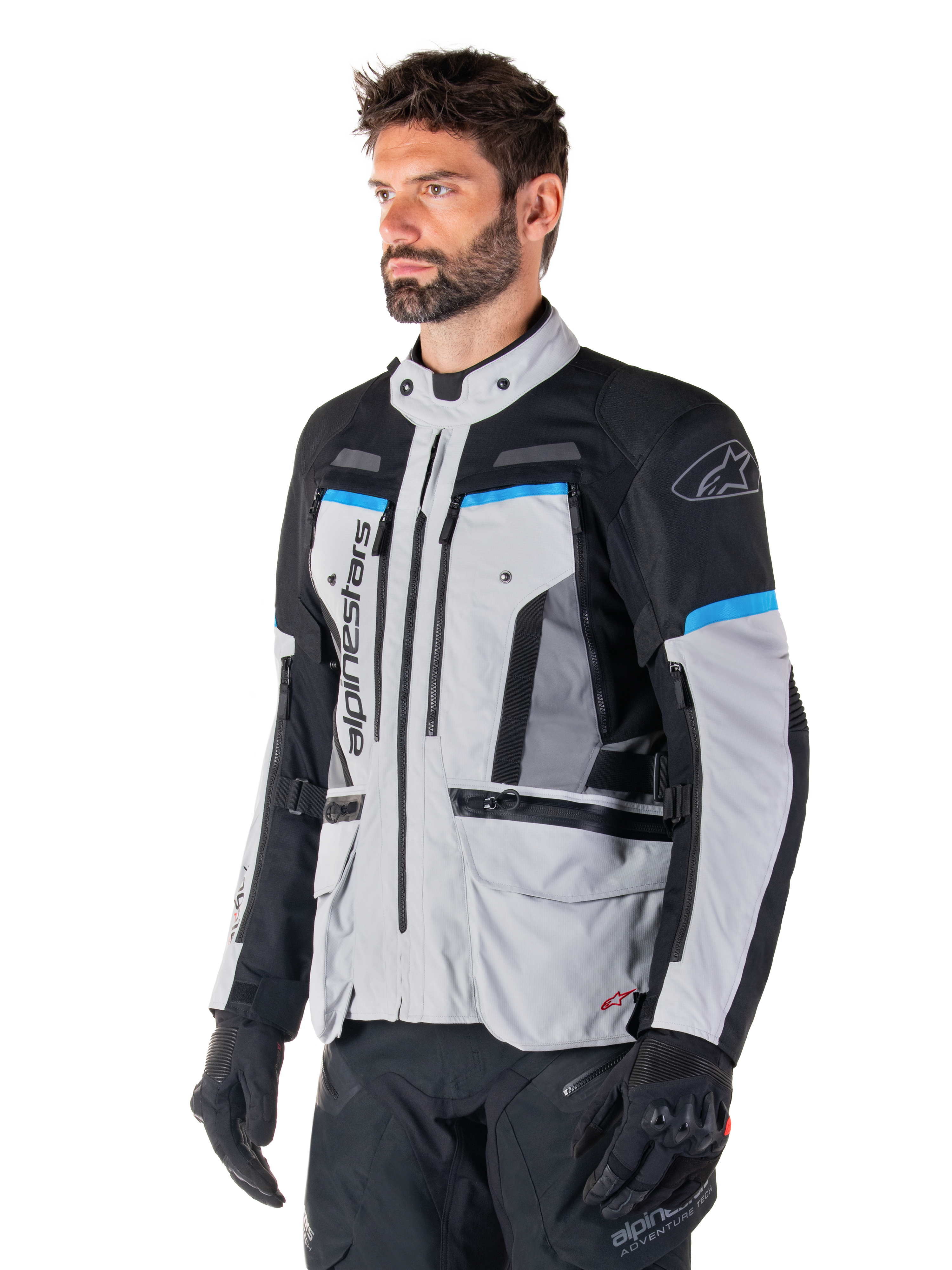 Alpinestars Bogota' Pro Drystar® Jacket, men's textile adventure motorcycle jacket in Ice Gray, Black, and Cyan.