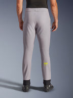 Alpinestars Aeroshell Pants, Motorcycle Pants, Mid Gray and Yellow Fluo, back view showing yellow Astars logo on the calf, black elastic ankle cuffs, modern softshell textile design for road and casual riding.