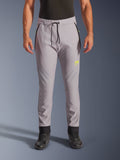 Alpinestars Aeroshell Pants, Mid Gray and Yellow Fluo, crossover softshell motorcycle pants, featuring a black drawstring waist and fitted ankle cuffs, yellow logo on left thigh, pre-curved knees, sporty jogger-style silhouette