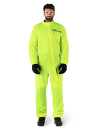 Alpinestars Hurricane Rain V2 Suit, Motorcycle Rain Suit, Yellow Fluo, male model wearing full-body protection with black gloves and boots, high collar with front storm flap, reflective logo on chest, high-visibility waterproof gear
