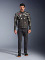 Alpinestars Axton Jacket, Motorcycle Jacket, Black Anthracite Red Tangerine, worn by a model with dark pants, featuring a wrap-around gray Alpinestars logo, red brand patches, and a water-resistant textile shell for urban road riding