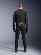 Alpinestars Viper Air V4 Jacket, Black Textile Motorcycle Jacket, back view with white Alpinestars star logo on lower back, worn with black riding pants and gloves, summer gear for road and sport riding