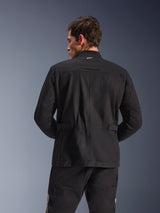 Alpinestars Dice Jacket, Urban Motorcycle Jacket, Black, back view showing pleated shoulders and adjustable waist tabs, field jacket aesthetic with small white logo on collar, protective textile gear for city riding