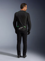 Alpinestars T-SPS Air V2 Jacket, Motorcycle Jacket, Black and Fluo Green, rear view featuring white logo on lower back, worn with matching black pants and boots, ventilated mesh design for sport riding