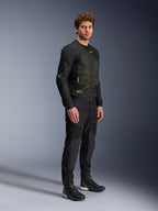 Alpinestars Troop-Air Jacket, Motorcycle Mesh Jacket, Black and Yellow Fluo, worn by a model with matching black pants and riding shoes, features high-airflow mesh construction with yellow fluorescent accents on the chest and sleeves, lightweight technical design for road riding