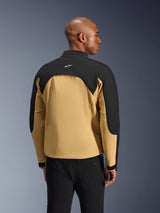Alpinestars Provoke Jacket, Urban Motorcycle Jacket, Black and Camel, rear view showing two-toned construction, mesh-lined back ventilation panel, small white logo on upper back, worn with black pants
