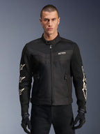 Alpinestars T-Dyno Air Jacket, Black textile motorcycle jacket, featuring white star graphics on sleeves and logo on chest, mesh panels for ventilation, vintage-inspired biker fit, worn with black gloves and pants