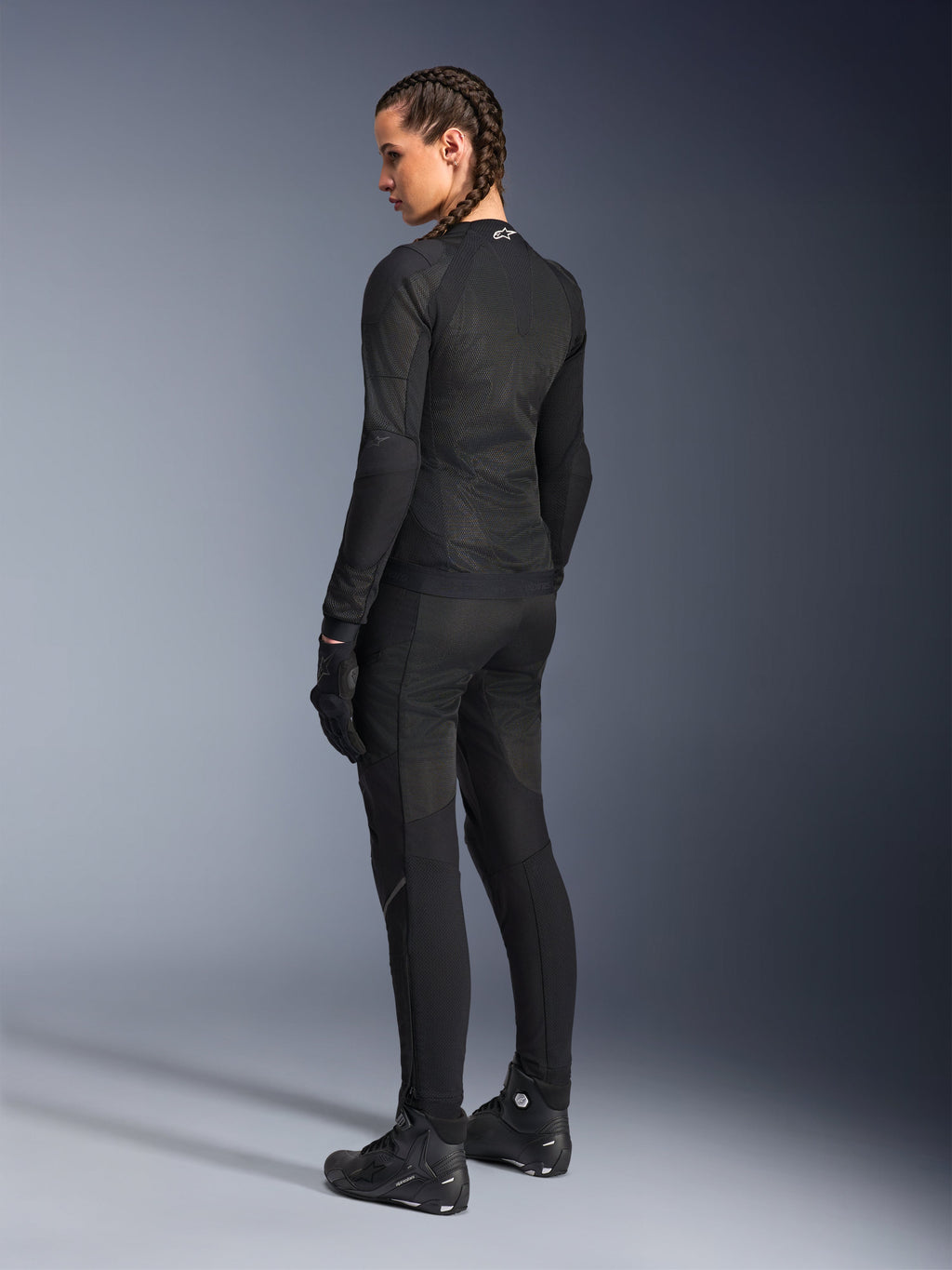 Alpinestars Woman Stella Troop-Air Jacket, Black, back view, worn with matching black motorcycle pants, gloves, and boots, slim-fit technical mesh construction for urban riding