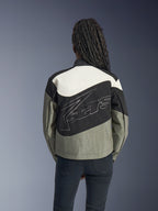 Alpinestars Stella Moshell Jacket, a women's urban motorcycle jacket in gray and black with large back logo graphics.