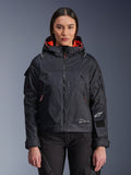 Alpinestars Molly Air Jacket, Women's Motorcycle Urban Jacket, Black with Fluo Coral interior lining, worn by a female model, hooded design with technical textile construction, zippered pockets and Alpinestars logo on the sleeve
