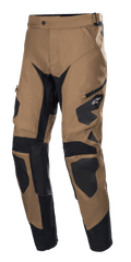 Alpinestars Venture XT Pants In Boot, Motorcycle Adventure Pants, Camel and Black, featuring reinforced black panels on knees and thighs, side zipper pocket, durable textured fabric, and a tapered leg design for off-road and touring