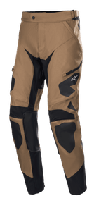 Alpinestars Venture XT Pants In Boot, Motorcycle Adventure Pants, Camel and Black, featuring reinforced black panels on knees and thighs, side zipper pocket, durable textured fabric, and a tapered leg design for off-road and touring