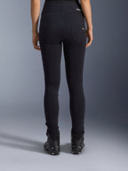 Alpinestars Stella Flex-Ast Leggings, Women's Motorcycle Leggings, Black, rear view showing back pockets and slim fit, worn with black motorcycle boots, urban riding style
