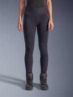 Alpinestars Stella Flex-Ast Leggings, Women's Motorcycle Leggings, Black, high-waisted fit with articulated knee panels and contoured seams, worn by model with black riding boots, urban performance riding apparel