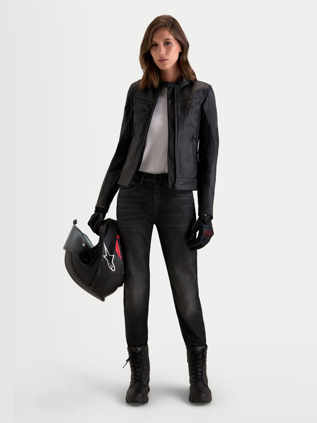 Alpinestars Stella Flex-AST 5 Denim Pants Short, women's urban contemporary motorcycle riding jeans in black washed denim, worn by a model holding a helmet
