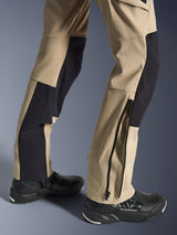 Alpinestars Stella Flex-AST Explorer Pants, Women's Motorcycle Pants, Sand and Black, close-up of the lower legs showing a zippered hem for boot fit, worn with black Alpinestars riding shoes, featuring durable ripstop and breathable stretch fabric panels.