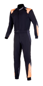 Alpinestars KMX-5 V2 Suit, One-Piece Karting Suit, Black with Orange Fluo and White accents, front view featuring orange shoulder epaulettes, forearm panels, and lower leg details, high collar with logo, professional motorsport protective gear