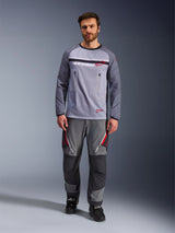 Alpinestars Maxdura Dual Jersey, Mid Gray and Dark Gray, adventure motorcycle jersey with mesh torso and zippered chest pockets, abrasion-resistant sleeves with integrated padding, worn with matching gray performance pants with red accents, technical off-road riding gear