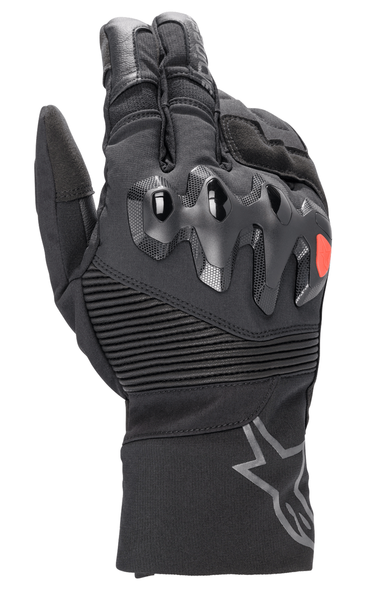 Alpinestars Bogota Drystar XF Gloves, full-length motorcycle touring gloves, black with a red logo accent, featuring over-injected knuckle protection, ribbed stretch wrist panels, and a long cuff with a grey star logo.