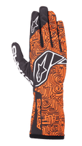 Alpinestars Tech-1 K Race V2 Vertical Gloves, Karting Racing Gloves, Orange Fluo and Black, featuring an intricate black maze-like geometric pattern, white Alpinestars logo on the back and index finger, ASTARS branding on the side wrist, lightweight breathable mesh design