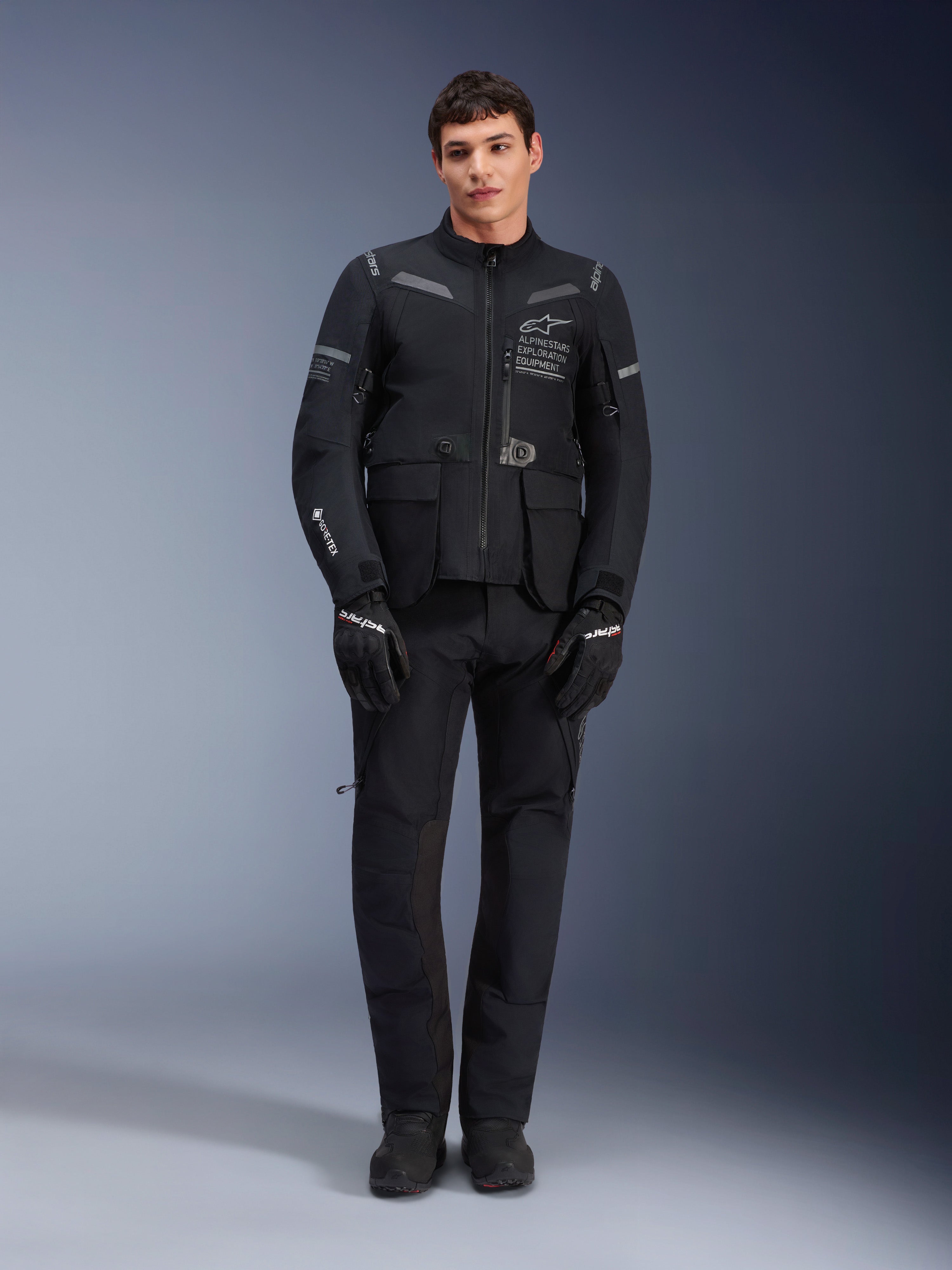 Alpinestars ST-7 2L GORE-TEX Pants, Black Motorcycle Touring Pants, Waterproof and Breathable, Full-body view worn with matching jacket, Premium technical construction for adventure riding